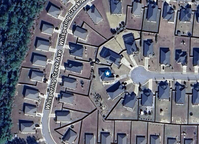 266 Partridge Lane Freeport, FL 32439 - Photo 36 of 36 front view of a building with street