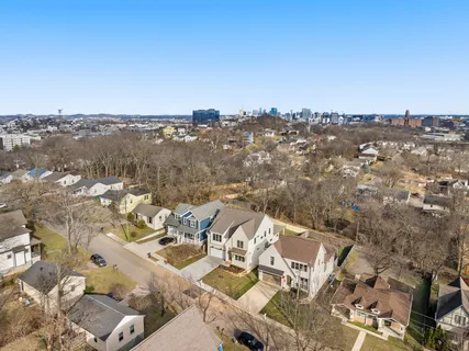 an aerial view of a city with lots of residential buildings