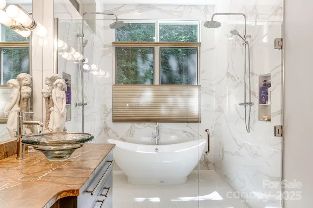 a view of a bathtub and table in a room