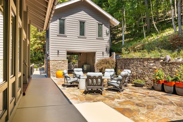 a view of swimming pool with outdoor seating