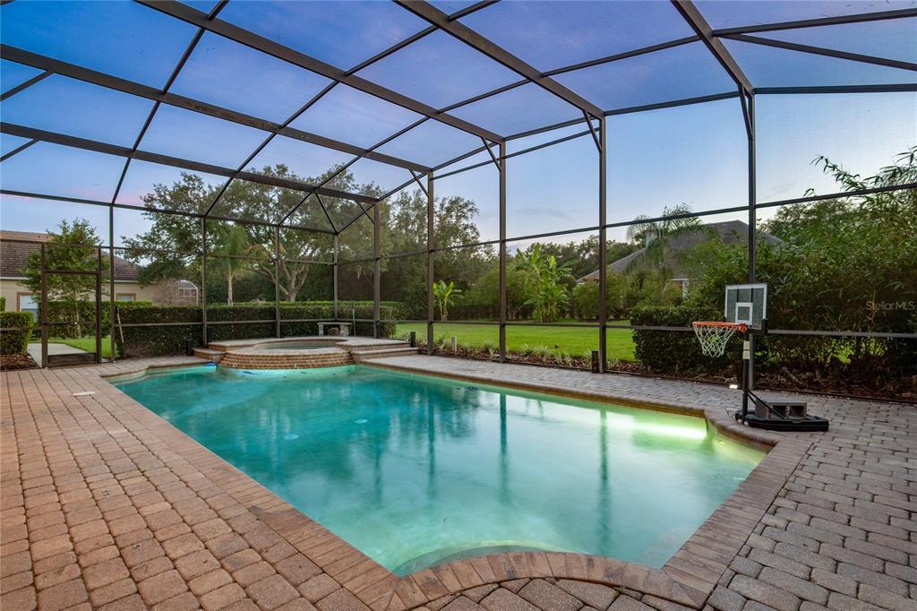 2002 Water Key Drive Windermere, FL 34786 - Photo 36 of 60 a view of a swimming pool with a patio