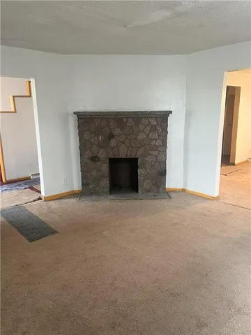 a kitchen with a stove and a sink