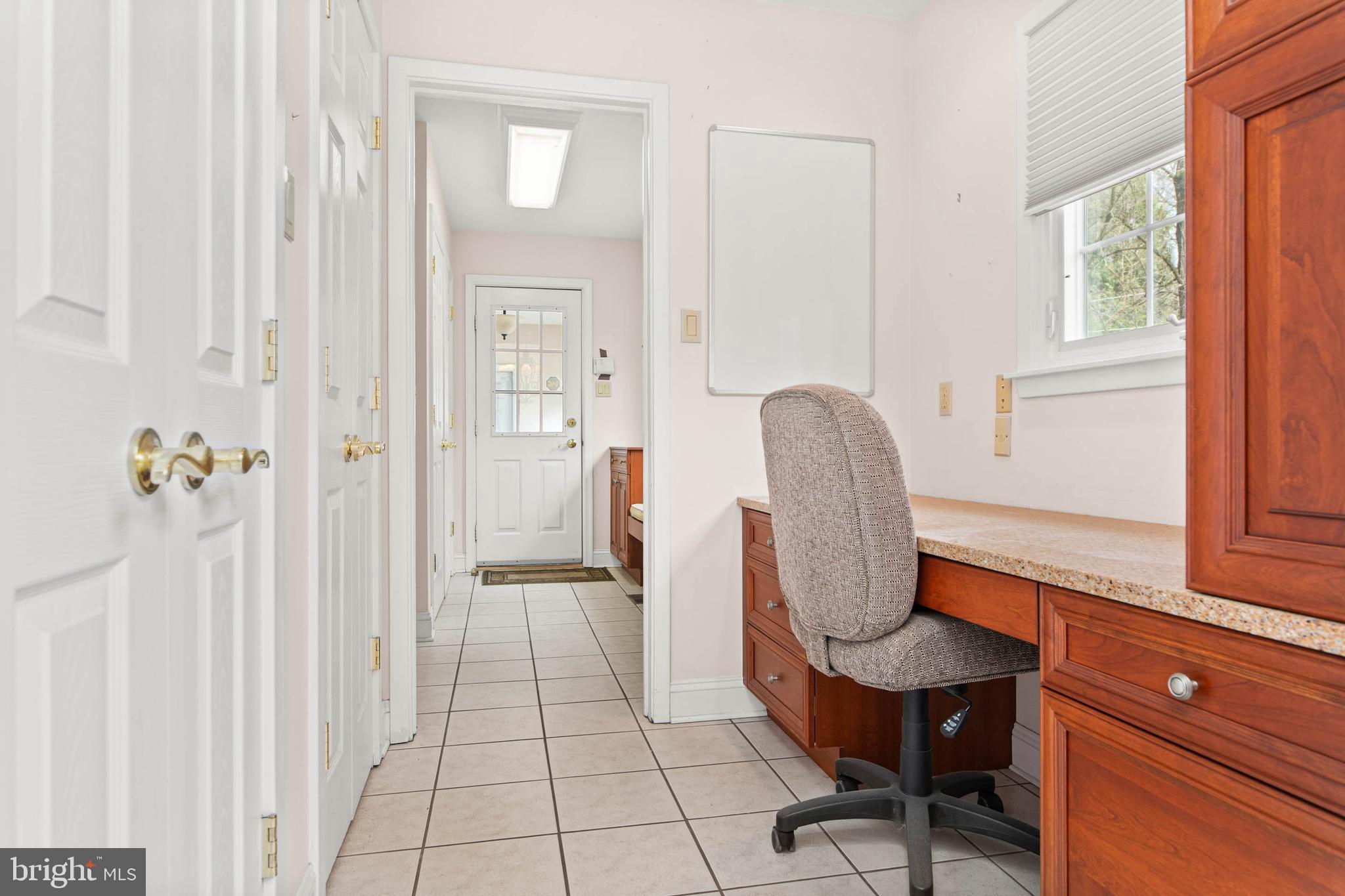 753 Mustin Lane Villanova, PA 19085 - Photo 17 of 40 a room with a chair and a window