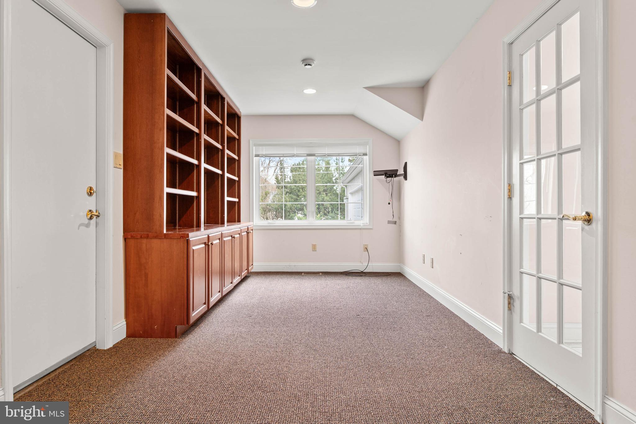 753 Mustin Lane Villanova, PA 19085 - Photo 18 of 40 a view of an empty room with a window