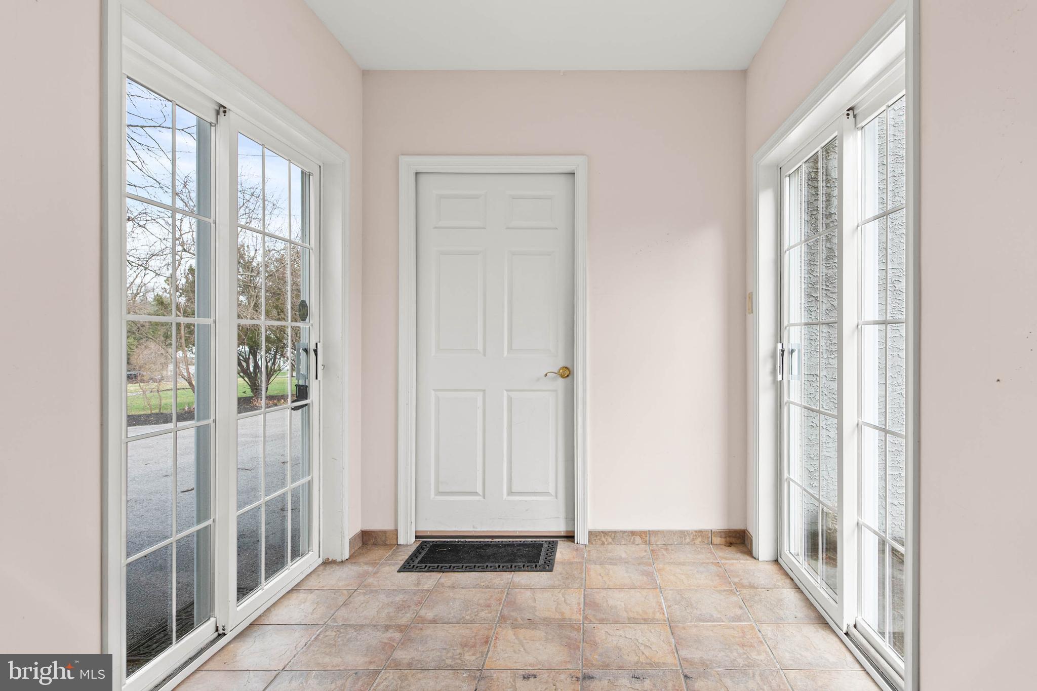 753 Mustin Lane Villanova, PA 19085 - Photo 19 of 40 a view of a hallway with windows