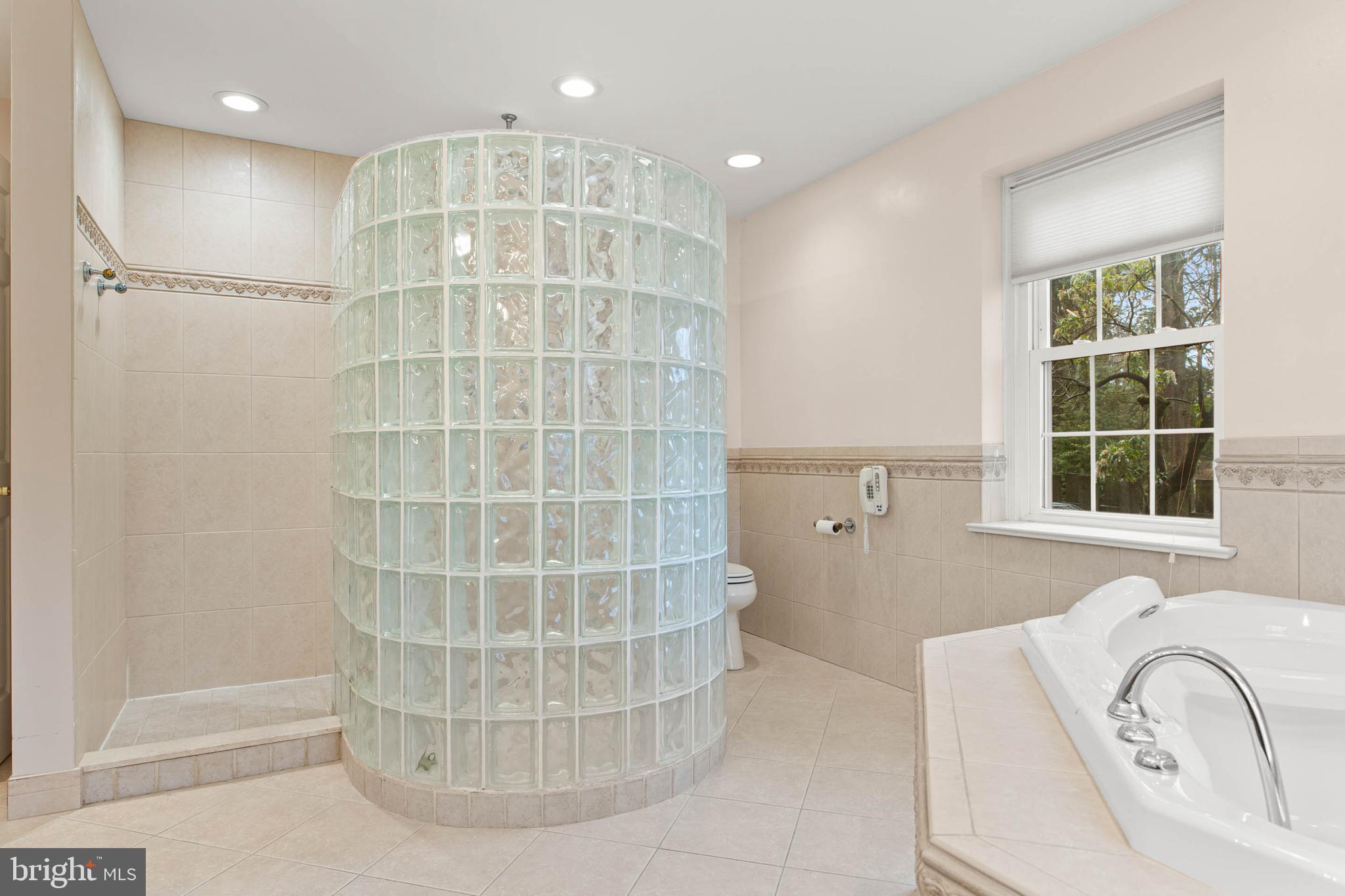 753 Mustin Lane Villanova, PA 19085 - Photo 23 of 40 a view of a bathroom sink and a window