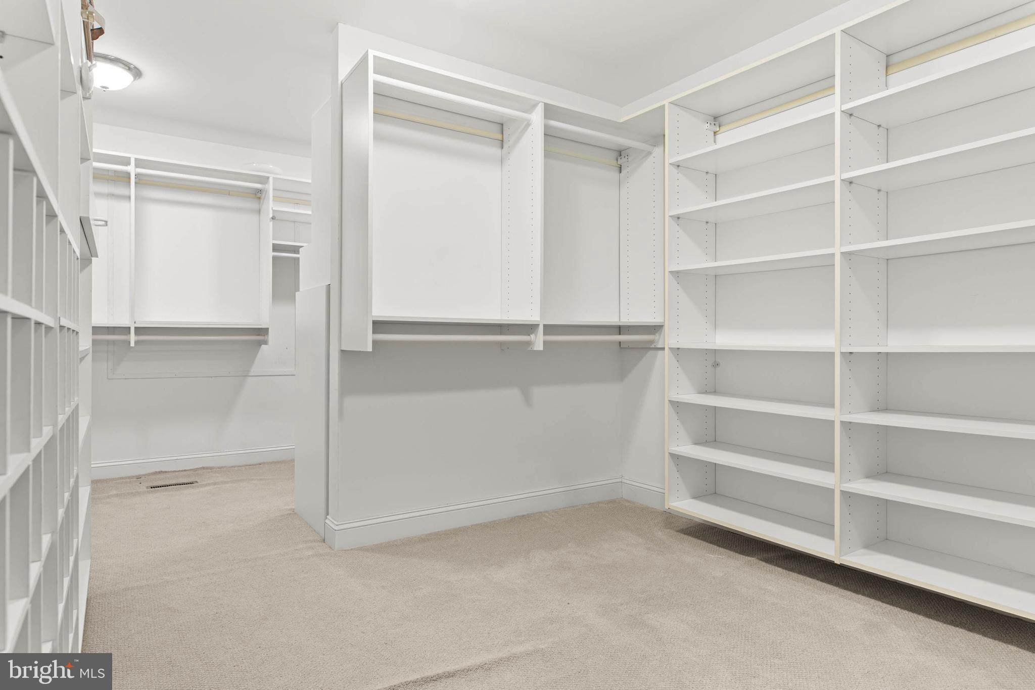 753 Mustin Lane Villanova, PA 19085 - Photo 24 of 40 a view of an empty walk in closet and a bathroom
