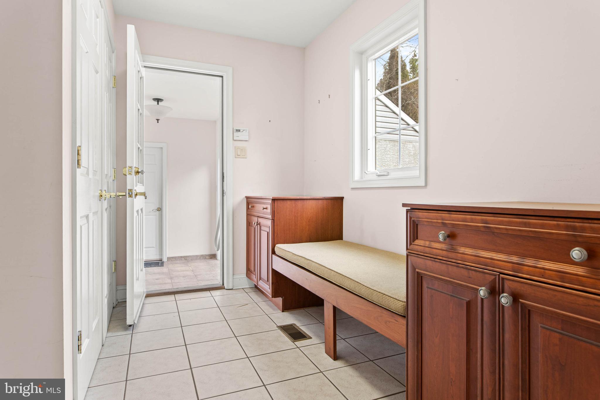 753 Mustin Lane Villanova, PA 19085 - Photo 27 of 40 a view of a livingroom with furniture and windows