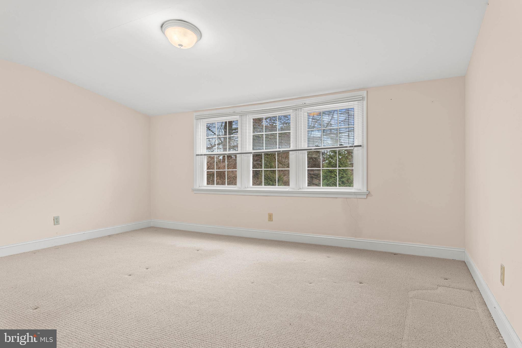 753 Mustin Lane Villanova, PA 19085 - Photo 35 of 40 an empty room with a window
