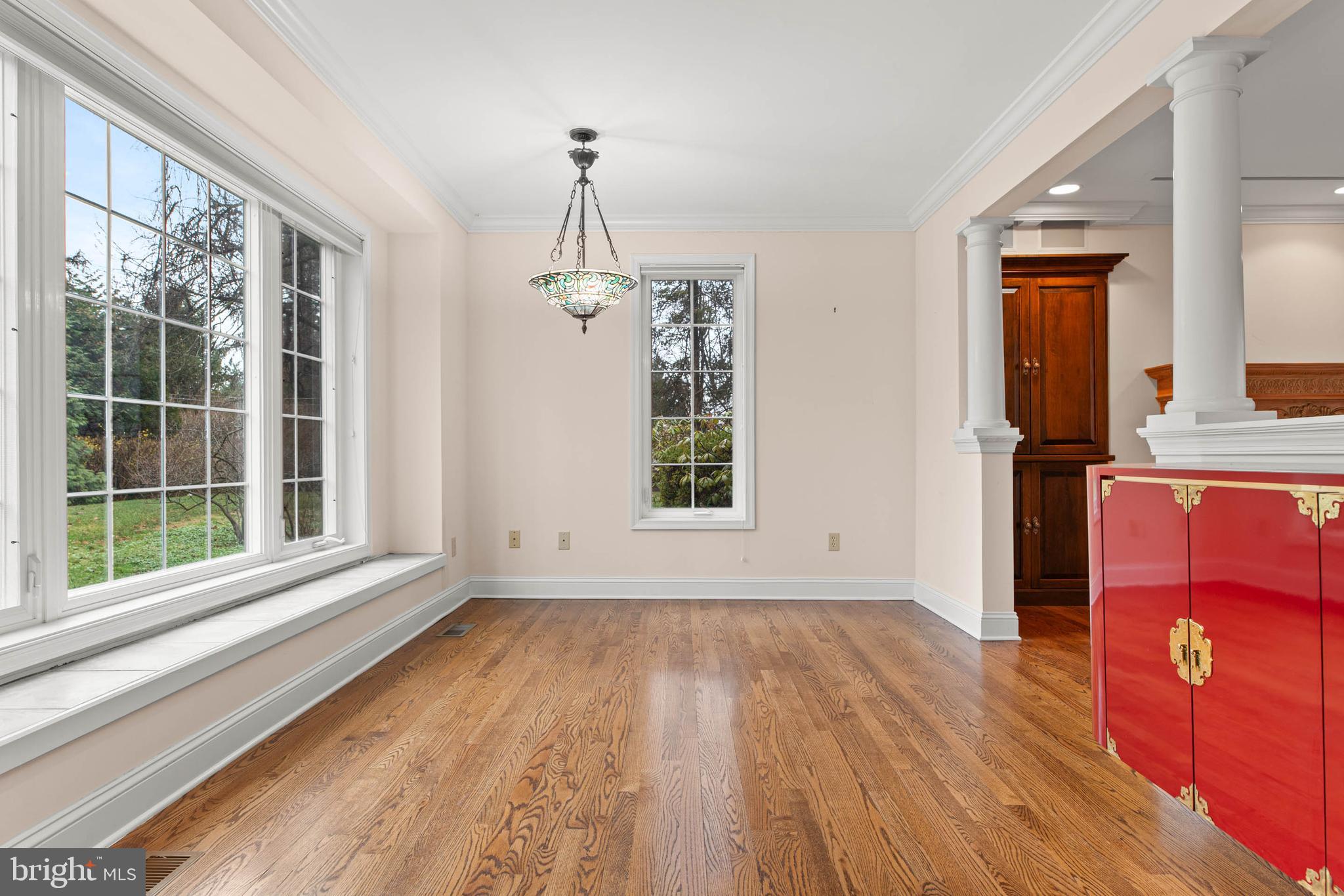753 Mustin Lane Villanova, PA 19085 - Photo 7 of 40 a view of empty room with wooden floor and fan