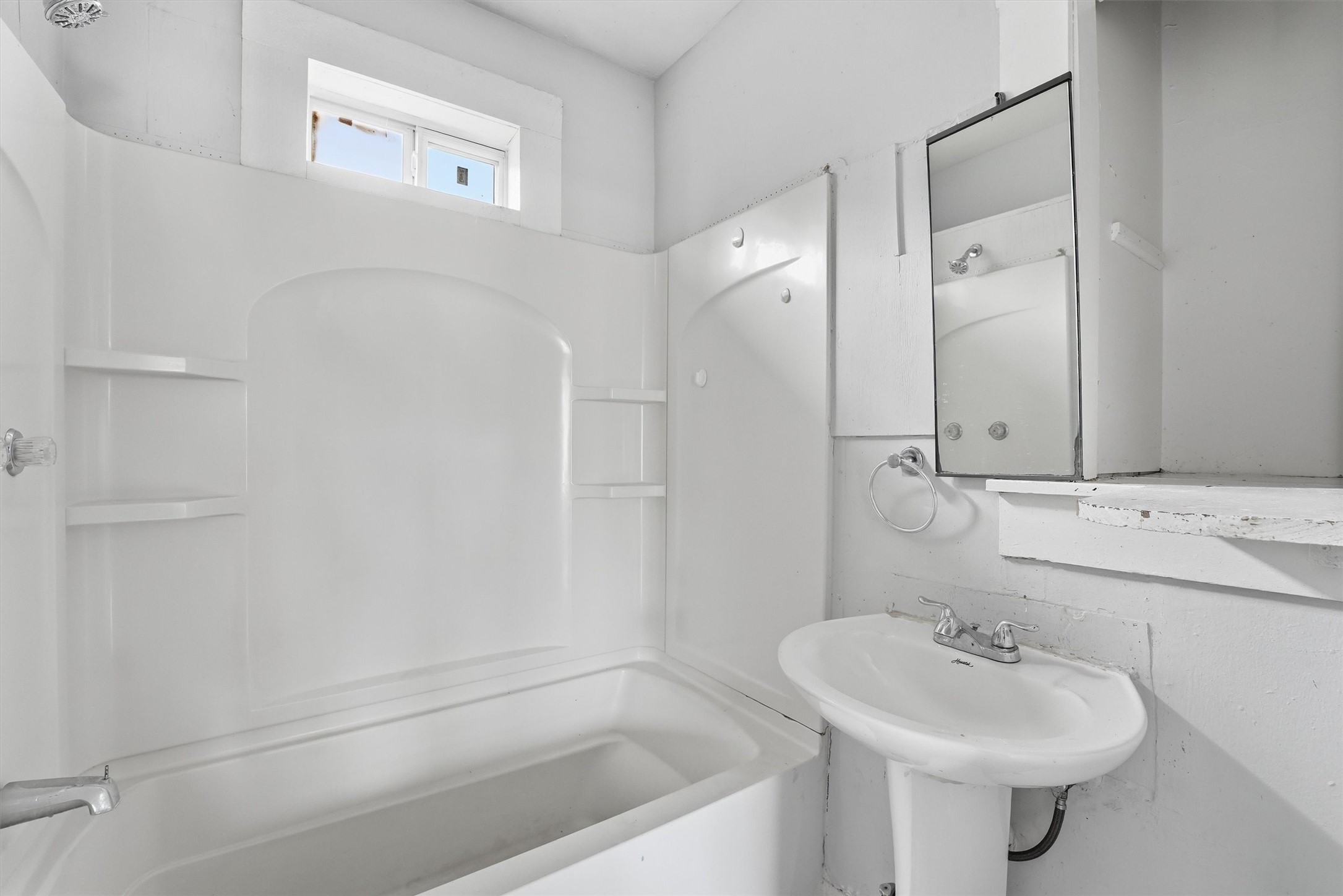 2420 Stevens Street Houston, TX 77026 - Photo 15 of 15 a bathroom with a sink a toilet and shower