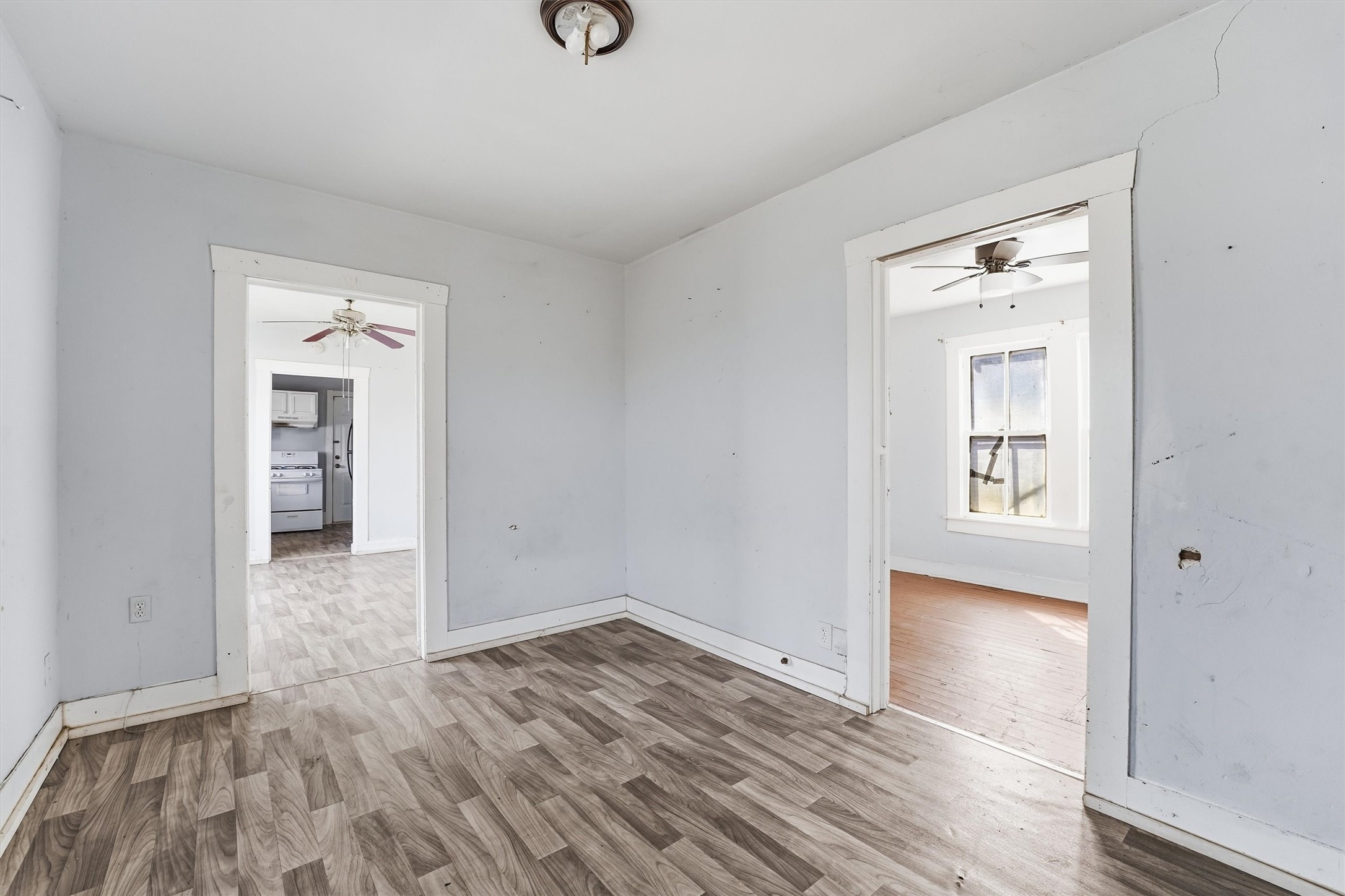 2420 Stevens Street Houston, TX 77026 - Photo 3 of 15 wooden floor in an empty room