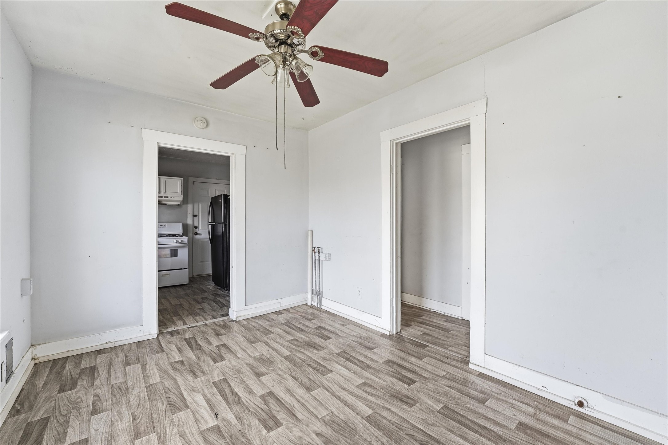 2420 Stevens Street Houston, TX 77026 - Photo 6 of 15 wooden floor in an empty room