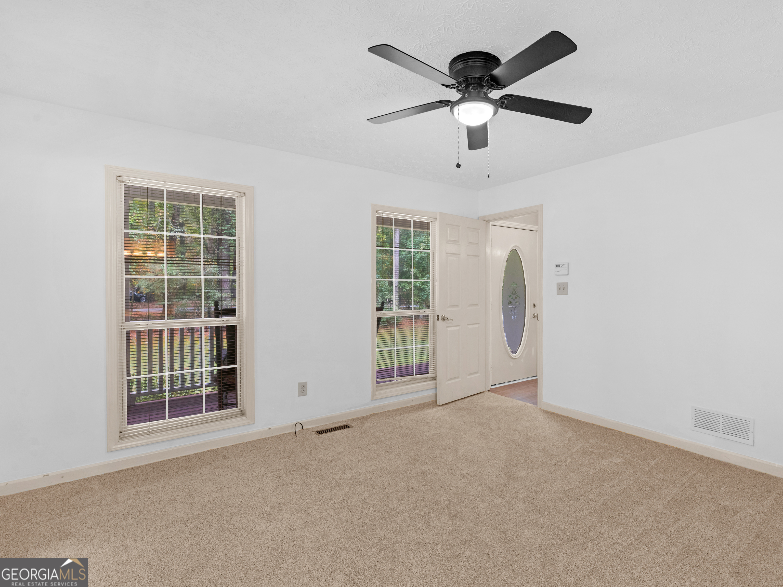 12012 Turner Road Hampton, GA 30228 - Photo 16 of 38 a view of an empty room with a window