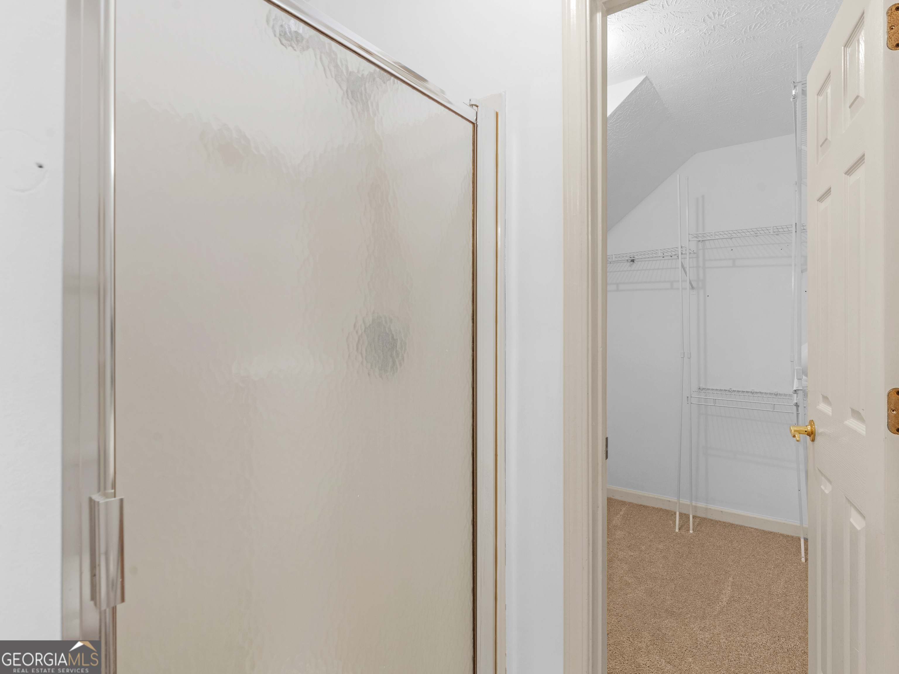 12012 Turner Road Hampton, GA 30228 - Photo 19 of 38 a bathroom with a glass shower door