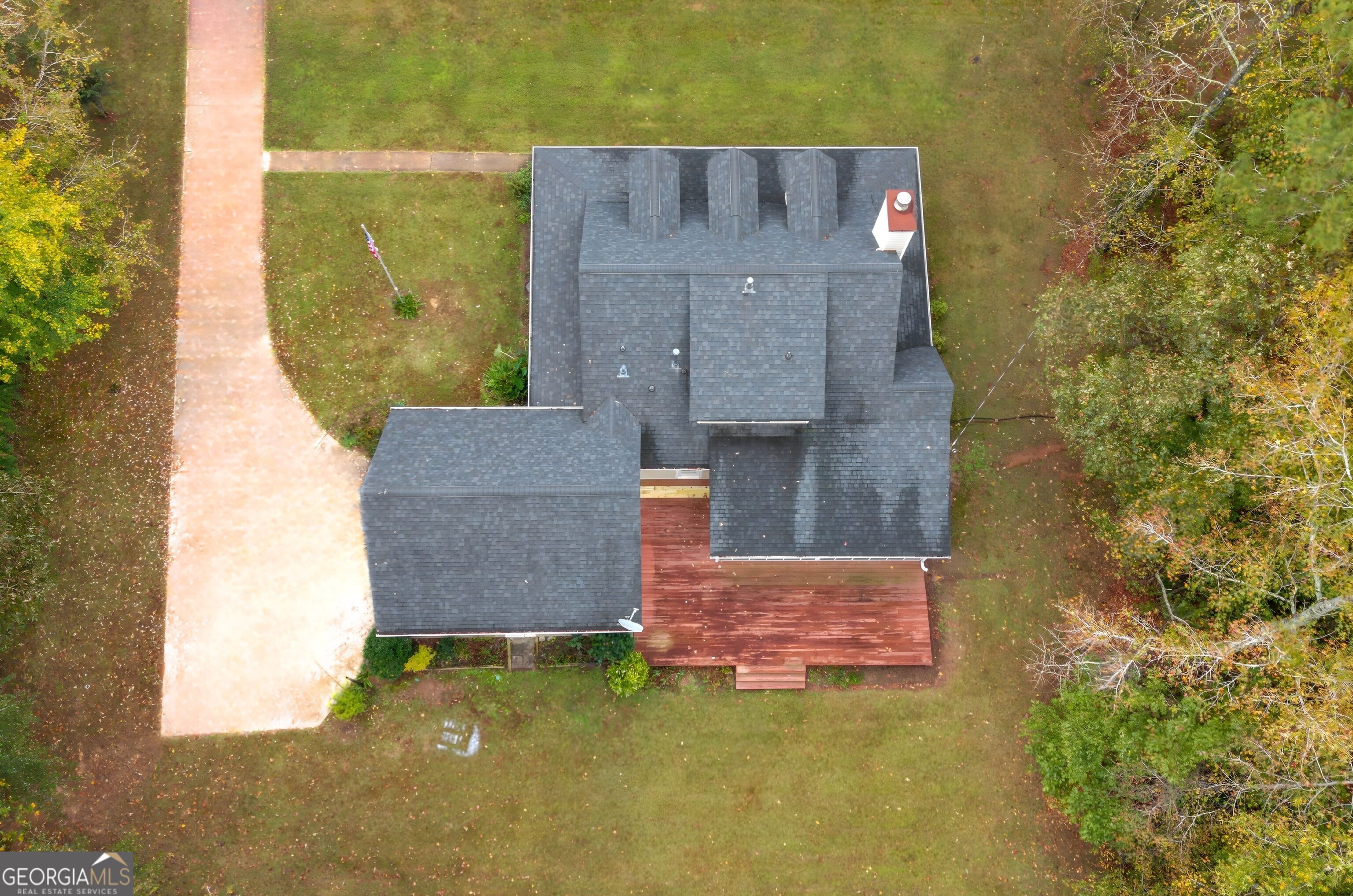 12012 Turner Road Hampton, GA 30228 - Photo 32 of 38 an aerial view of a house with a backyard