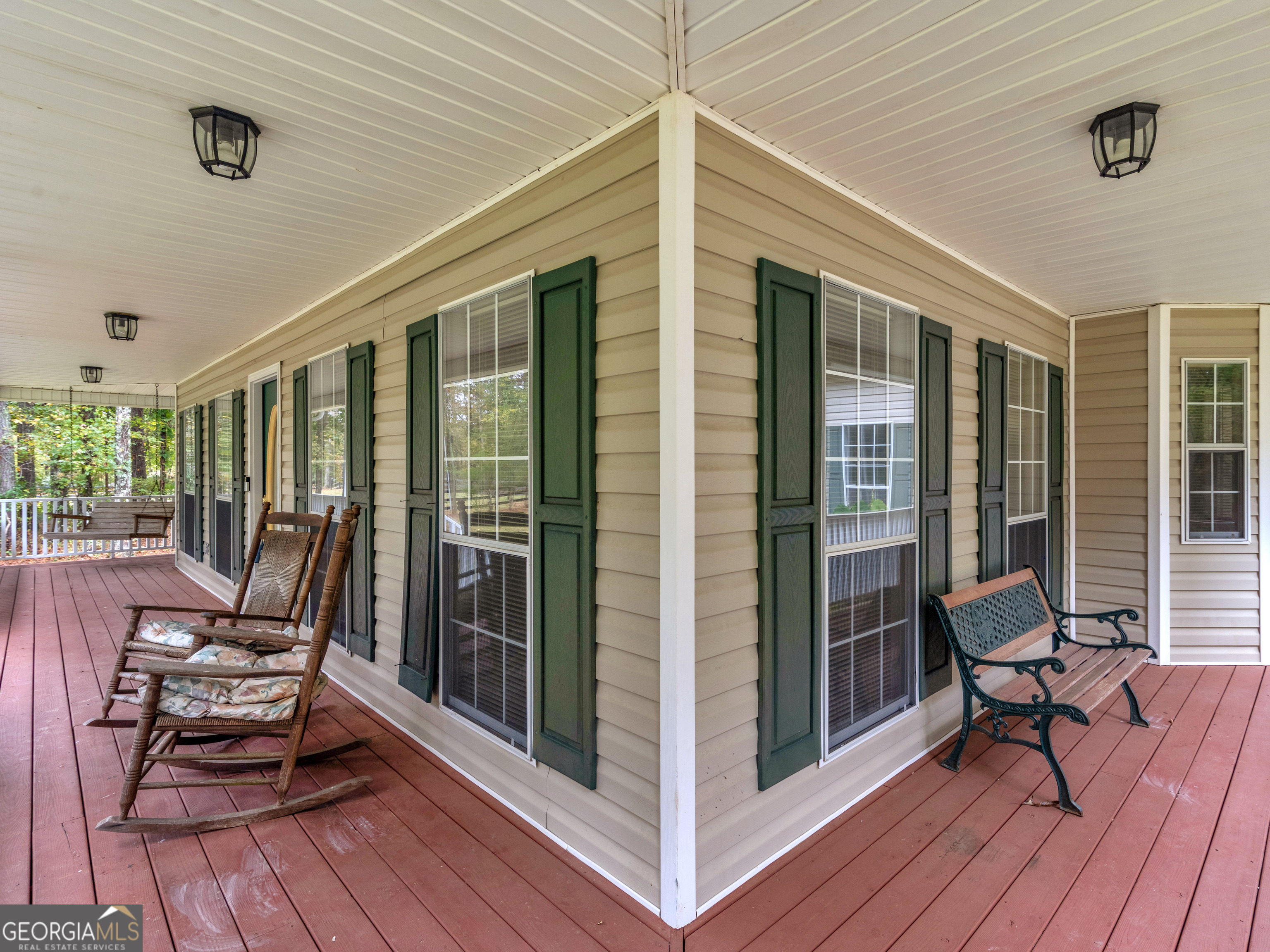 12012 Turner Road Hampton, GA 30228 - Photo 36 of 38 a view of a chairs and table in a patio
