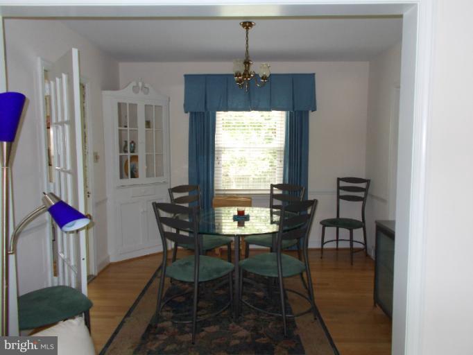 9504 Monroe Street Silver Spring, MD 20910 - Photo 23 of 26 a dining room with furniture and window