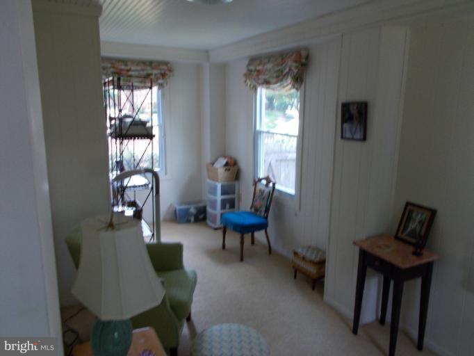 9504 Monroe Street Silver Spring, MD 20910 - Photo 5 of 26 a living room with furniture and a window