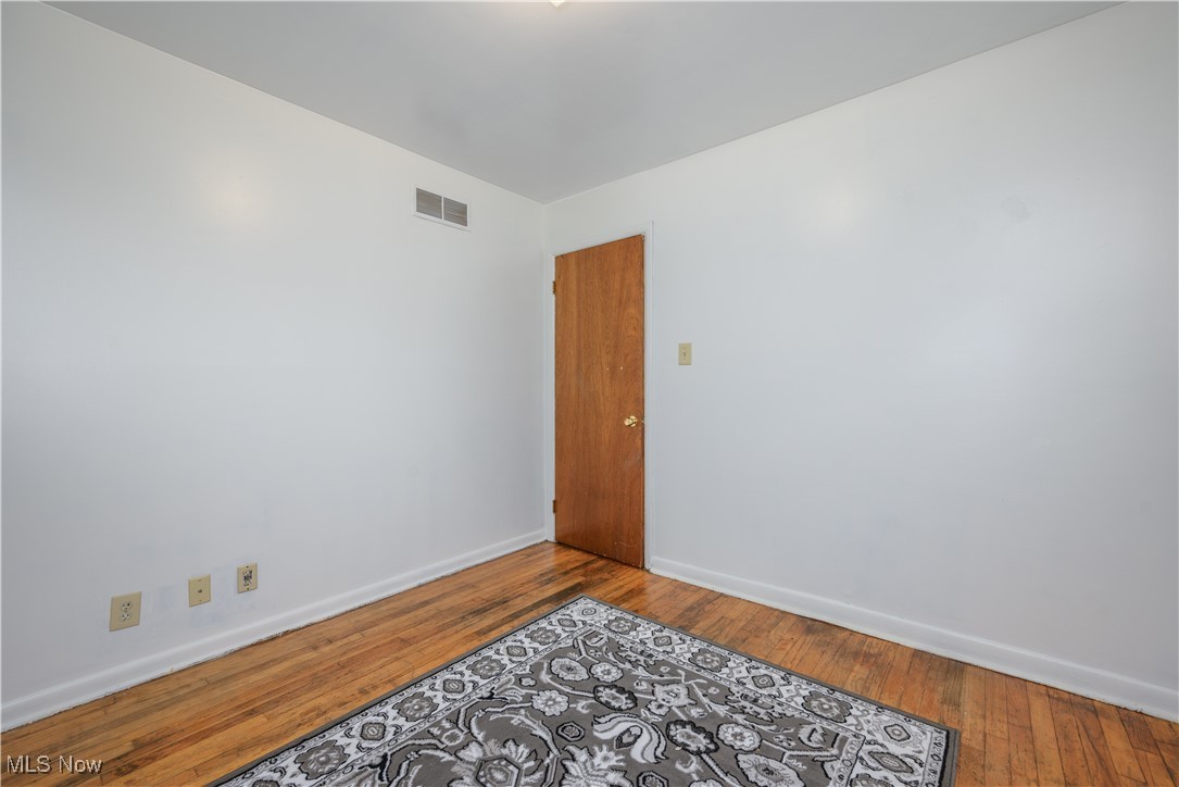 455 Rutland Street Akron, OH 44305 - Photo 16 of 28 Bedroom 1 with hardwood floors