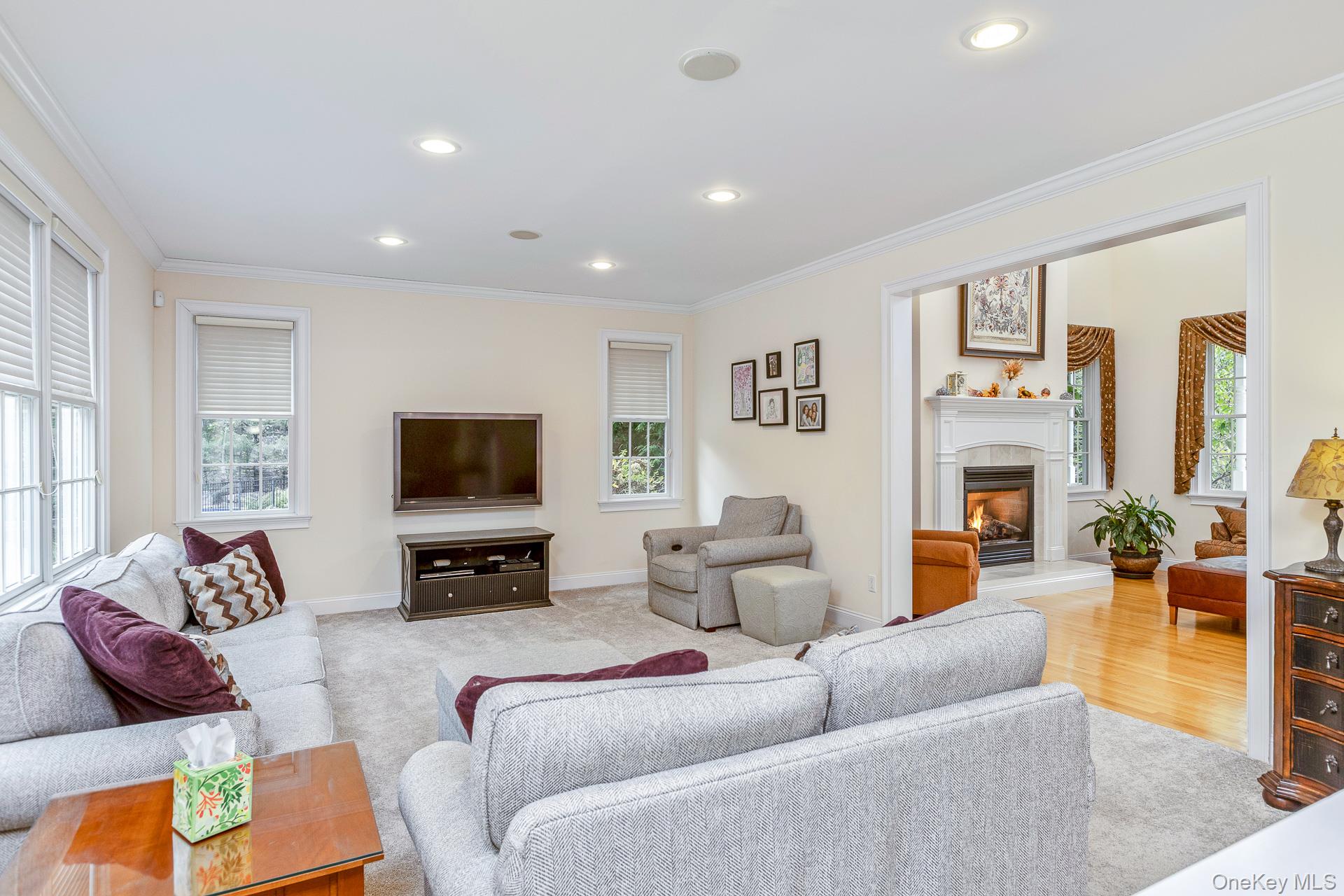 4 Martin Avenue Shoreham, NY 11786 - Photo 13 of 50 a living room with furniture and a flat screen tv
