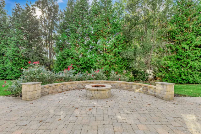 a house view with a sitting space and garden