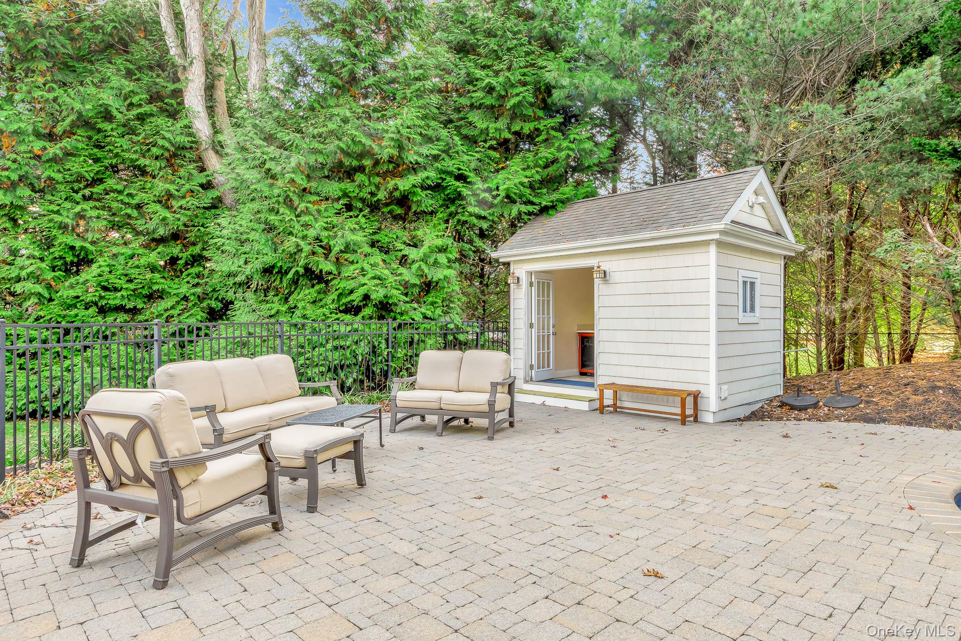 4 Martin Avenue Shoreham, NY 11786 - Photo 38 of 50 a view of a patio with a table and chairs and a couch