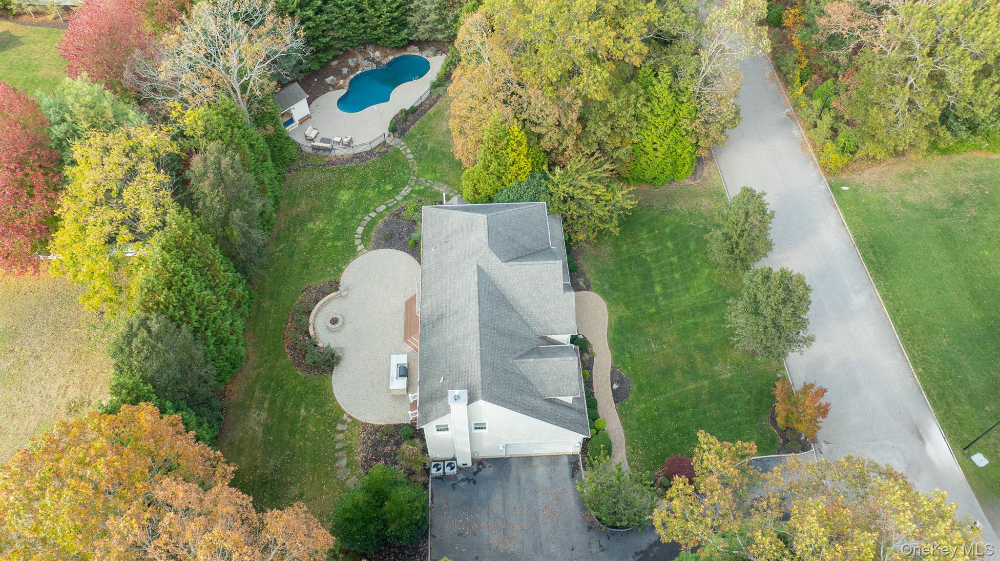 4 Martin Avenue Shoreham, NY 11786 - Photo 45 of 50 an aerial view of a house with outdoor space and a lake view
