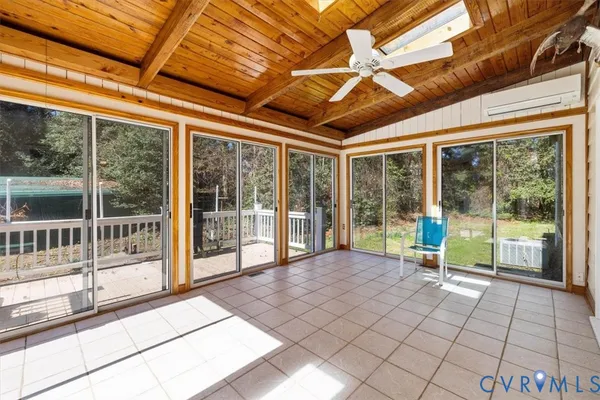 a view of an empty room with a balcony