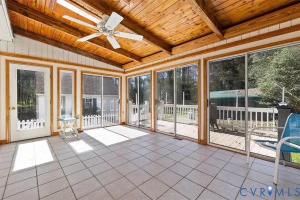 a view of front door with outdoor seating