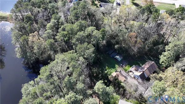 an aerial view of house with yard
