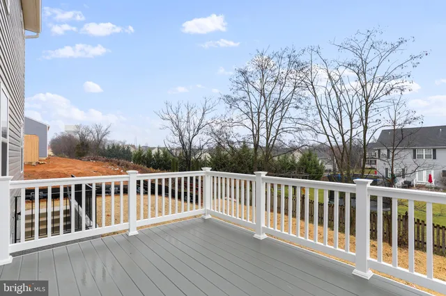 a view of a wooden fence