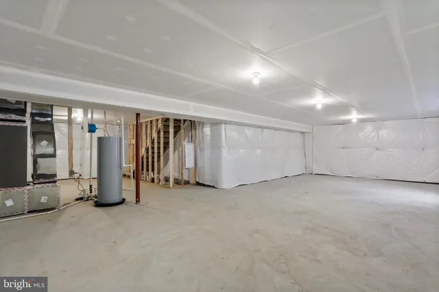 an empty room with furniture and closet