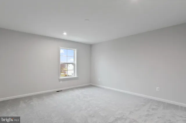a view of an empty room with window