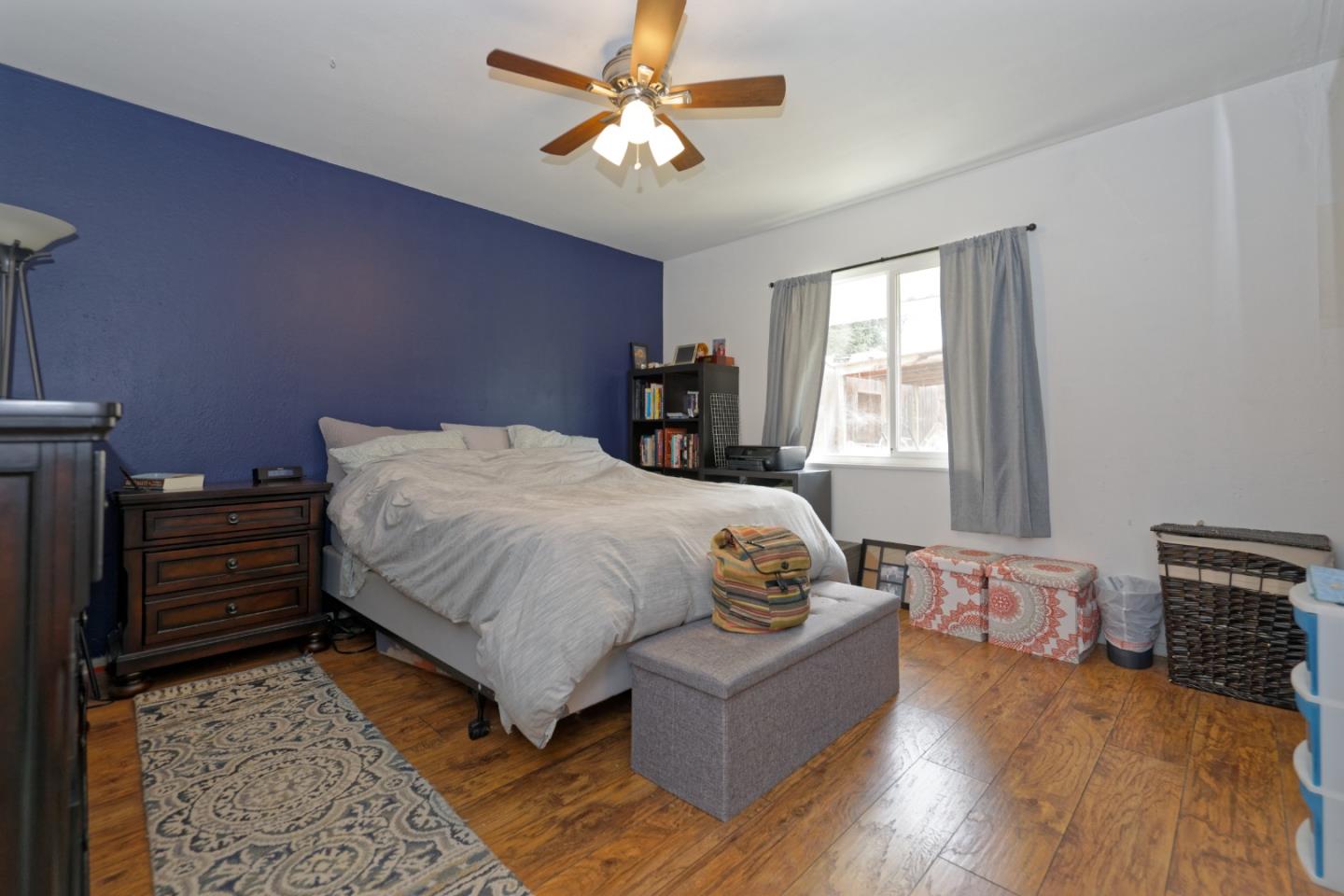 3269 Rama Drive San Jose, CA 95124 - Photo 13 of 21 a bed room with a bed and a chandelier