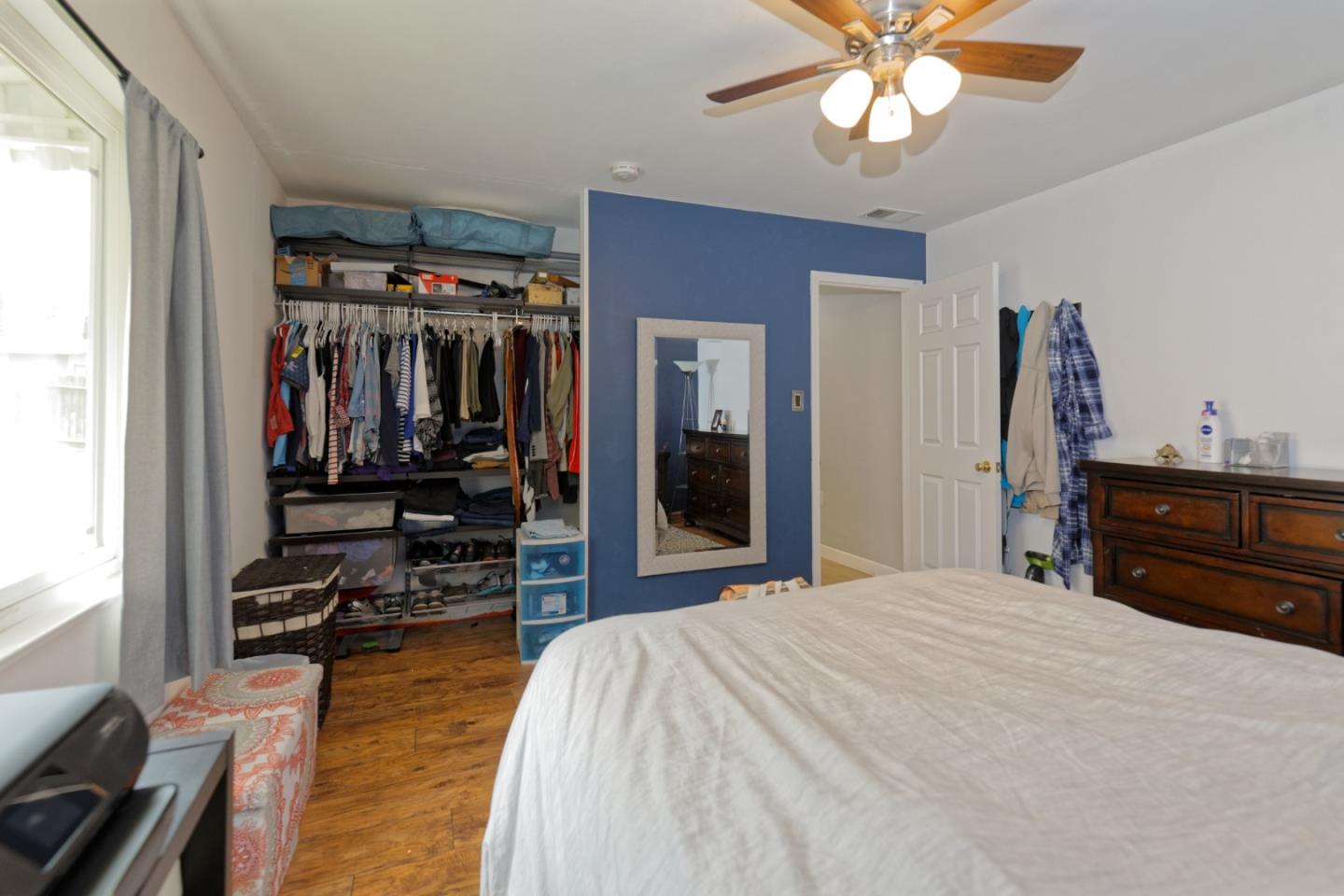3269 Rama Drive San Jose, CA 95124 - Photo 14 of 21 a bed room with a bed and a flat tv screen on a dresser