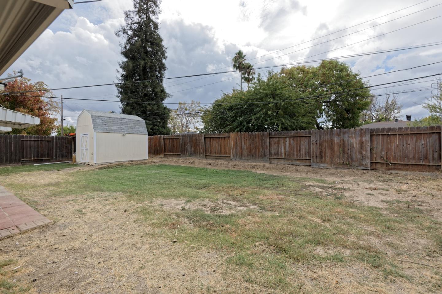 3269 Rama Drive San Jose, CA 95124 - Photo 18 of 21 a view of a backyard with large trees