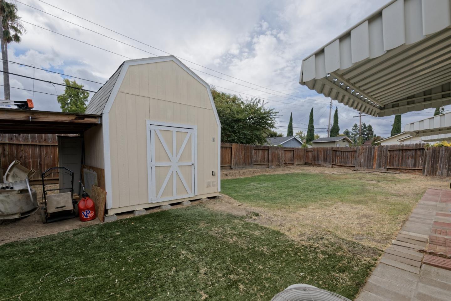 3269 Rama Drive San Jose, CA 95124 - Photo 19 of 21 a view of backyard with barbeque grill and potted plants