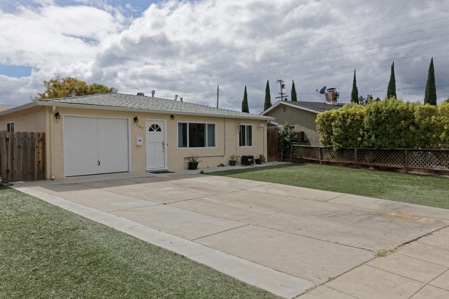 3269 Rama Drive San Jose, CA 95124 - Photo 21 of 21 a front view of a house with a yard and garage
