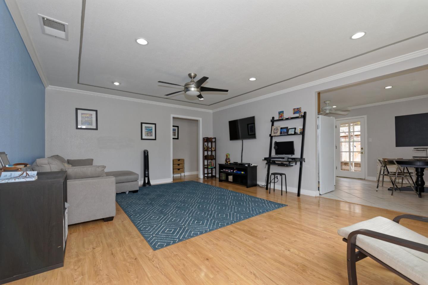 3269 Rama Drive San Jose, CA 95124 - Photo 3 of 21 a living room with furniture and a flat screen tv