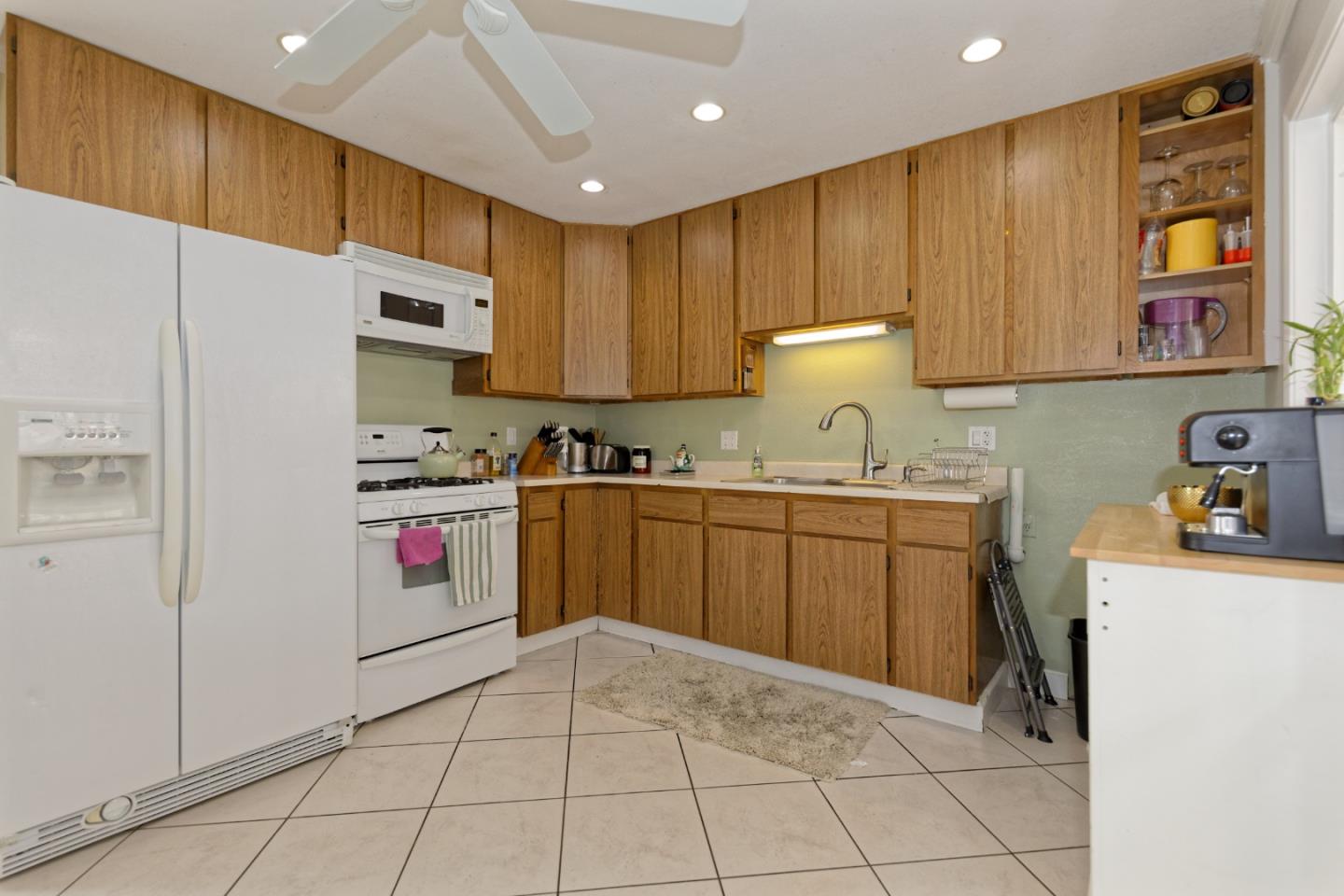 3269 Rama Drive San Jose, CA 95124 - Photo 5 of 21 a kitchen with a sink a stove and refrigerator