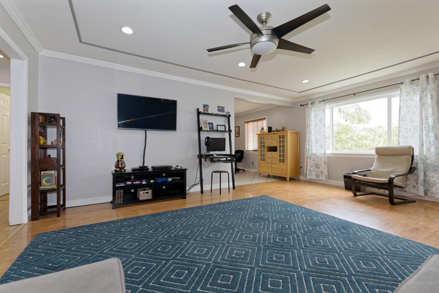 3269 Rama Drive San Jose, CA 95124 - Photo 7 of 21 a living room with furniture and a flat screen tv