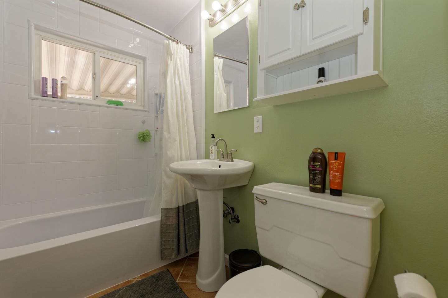 3269 Rama Drive San Jose, CA 95124 - Photo 8 of 21 a bathroom with a sink a toilet and shower