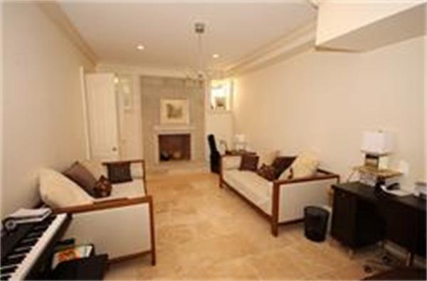 70 Pickwick Road Newton, MA 02465 - Photo 15 of 17 a living room with furniture and a fireplace