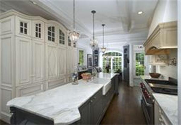 70 Pickwick Road Newton, MA 02465 - Photo 4 of 17 a kitchen with counter top space and stainless steel appliances