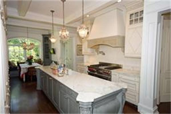 70 Pickwick Road Newton, MA 02465 - Photo 5 of 17 a kitchen with a sink a stove and a refrigerator