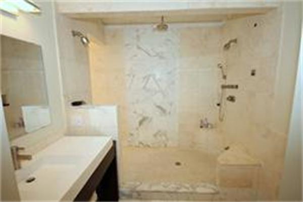 70 Pickwick Road Newton, MA 02465 - Photo 6 of 17 a bathroom with a sink shower and a mirror