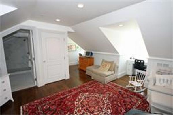 70 Pickwick Road Newton, MA 02465 - Photo 8 of 17 a living room with furniture and a rug