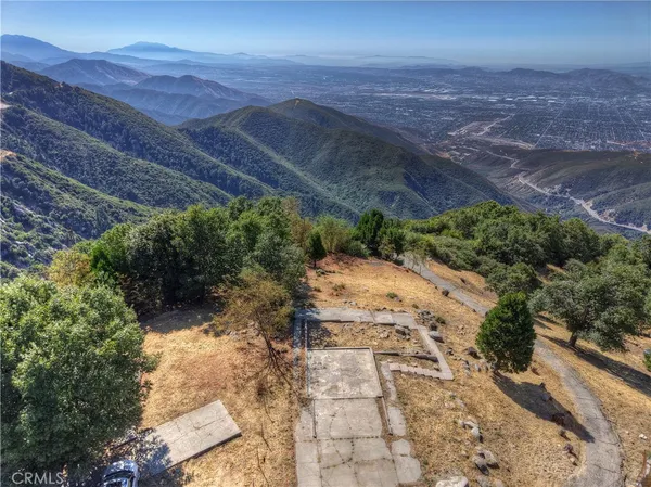 a view of a backyard with mountain view