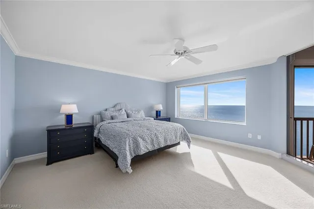 a spacious bedroom with a bed and a window